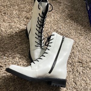 White and black lace up boots